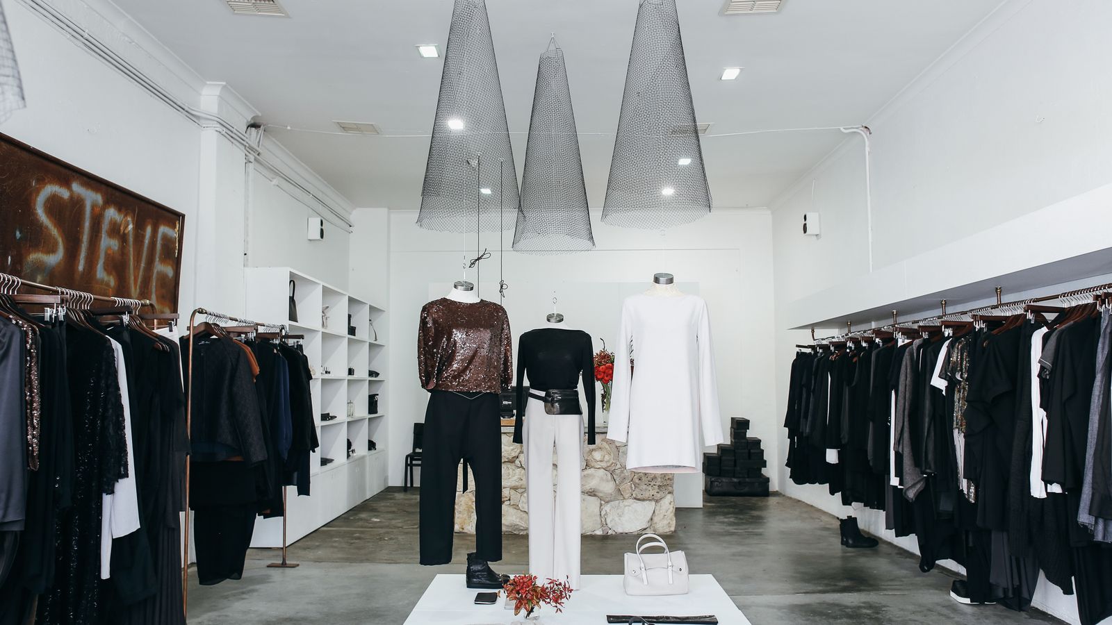 A chic boutique interior with elegant clothing displayed on racks