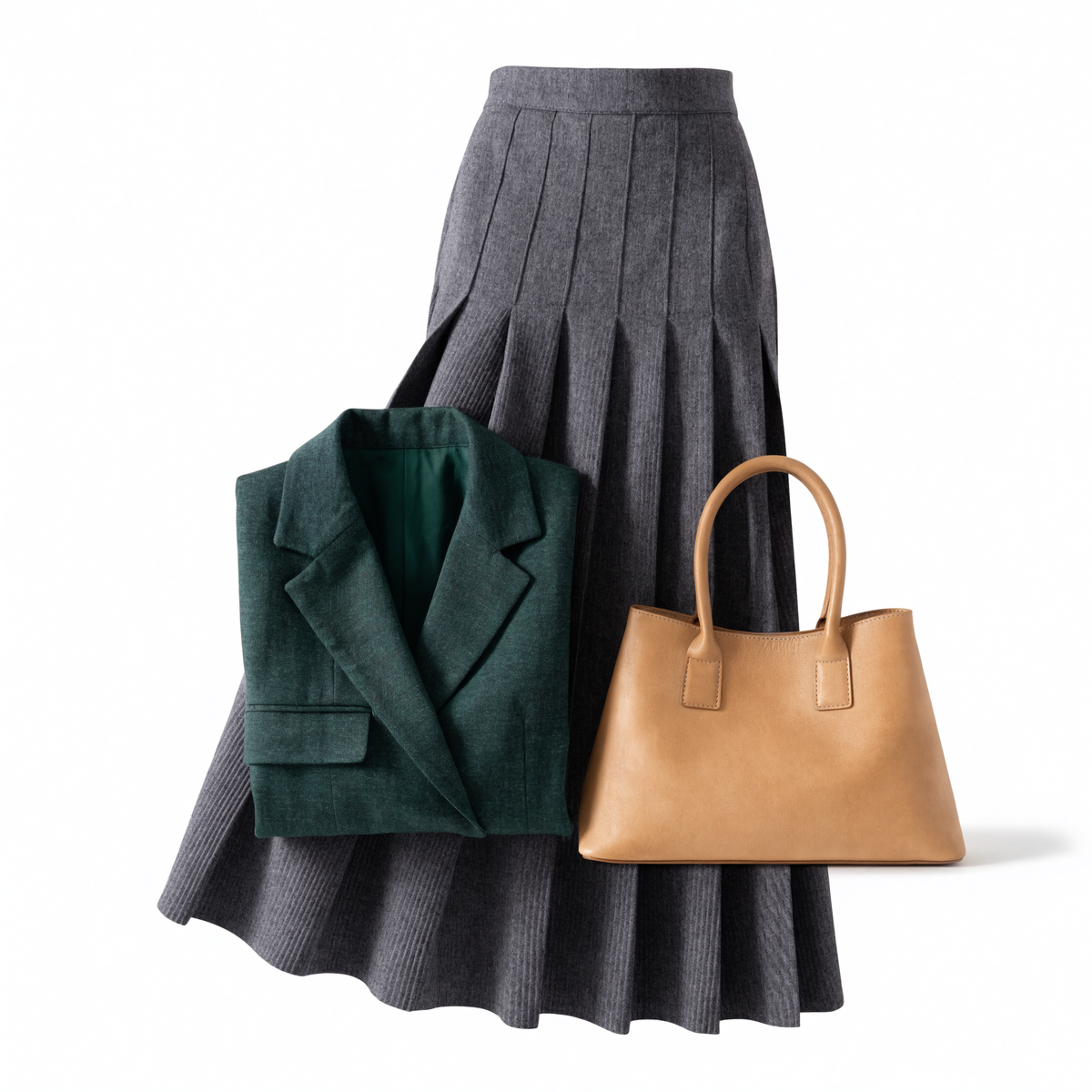 A green tailored blazer, grey pleated skirt and tan leather handbag on white