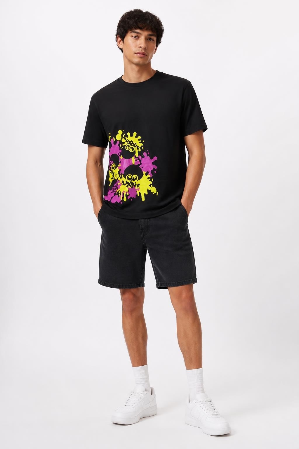 Uniqlo UT Black Graphic Skull Print Tee - pre-loved at Why Go Less, Lebanon