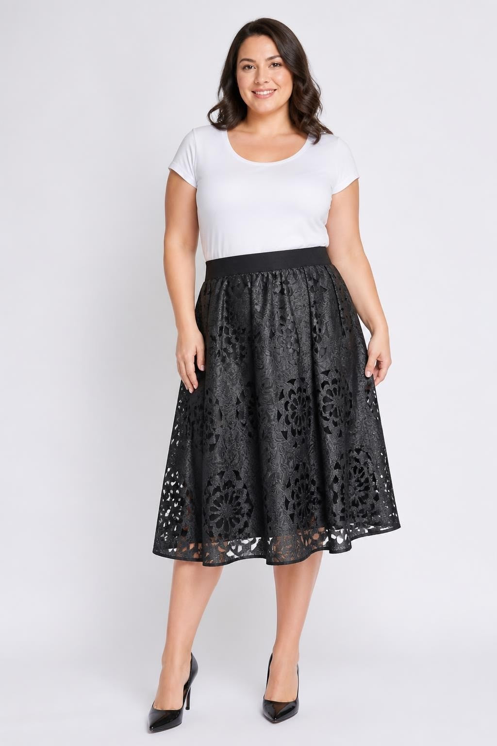 Black Laser-cut Floral Jacquard Mini Skirt - pre-loved at Why Go Less, Lebanon