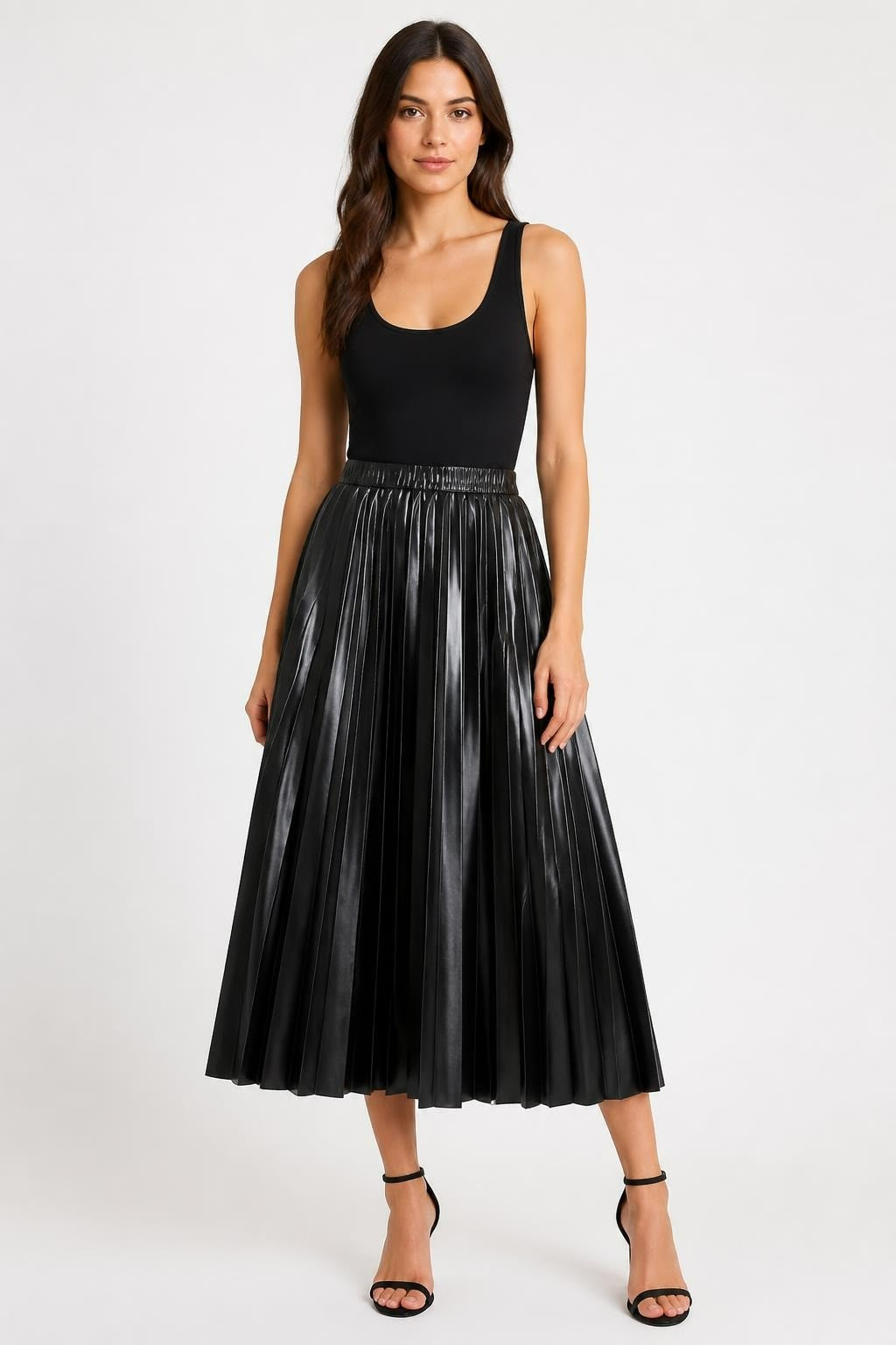 Black Pleated Faux-leather Midi Skirt - pre-loved at Why Go Less, Lebanon