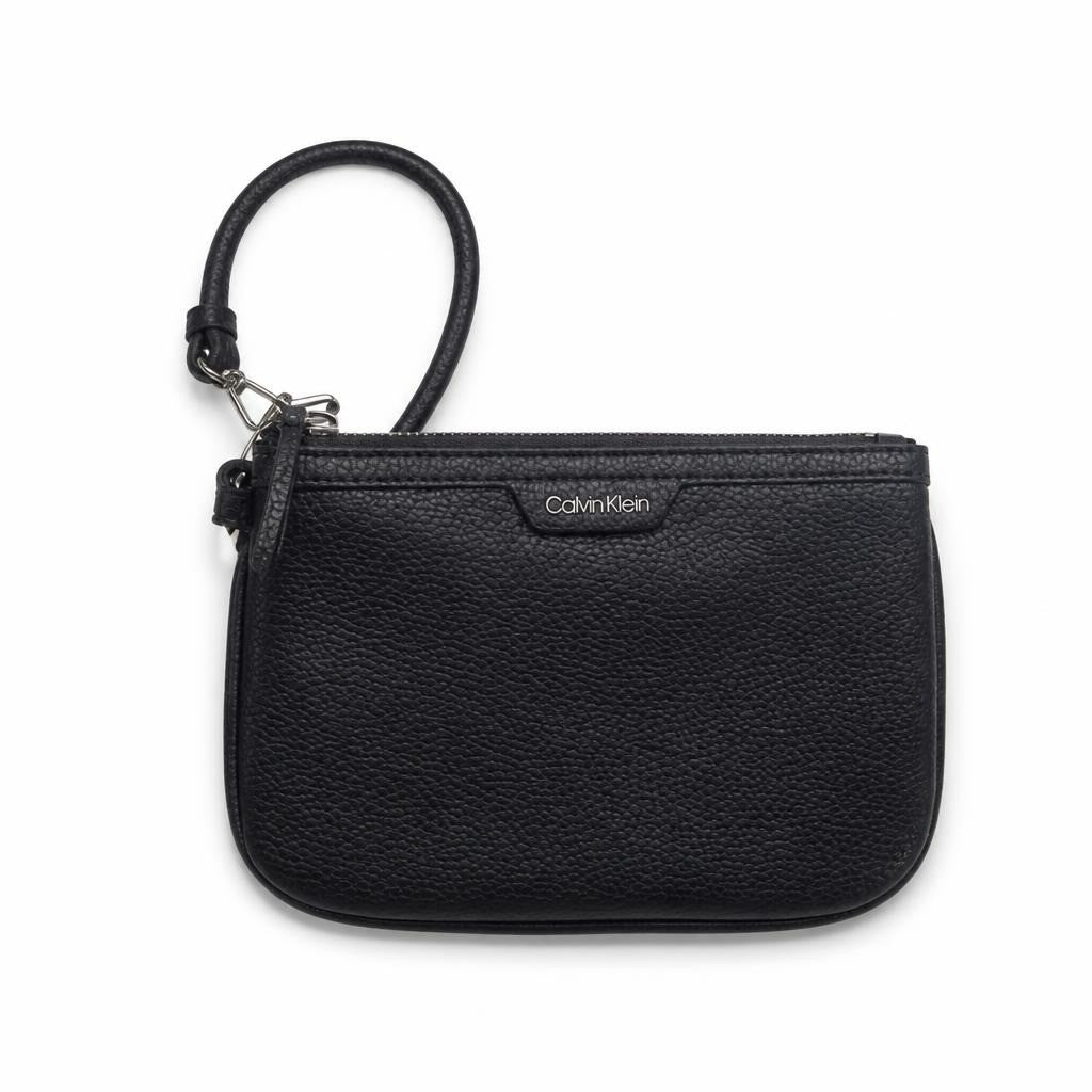 Calvin Klein Navy Pebbled Leather Wristlet Clutch - pre-loved at Why Go Less, Lebanon