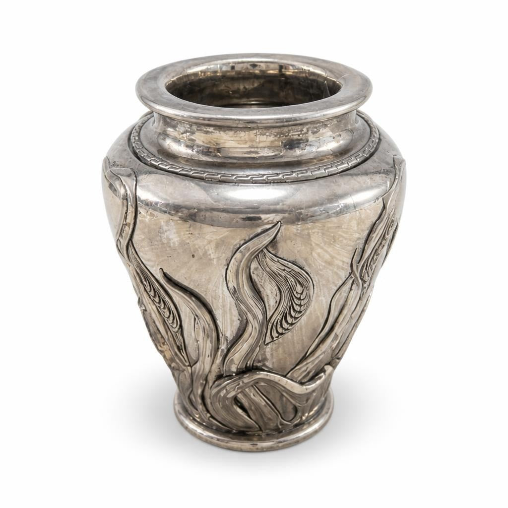 Silver-tone metal vase with floral relief - second-hand at Why Go Less, Dekwaneh, Lebanon