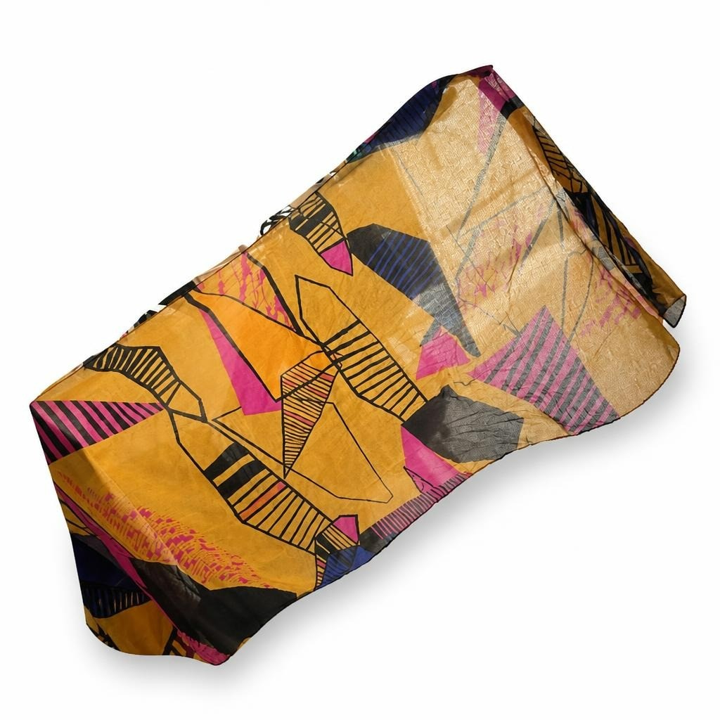 Abstract print colorful scarf/wrap, orange pink black - white studio shot, second-hand at Why Go Less, Dekwaneh, Lebanon