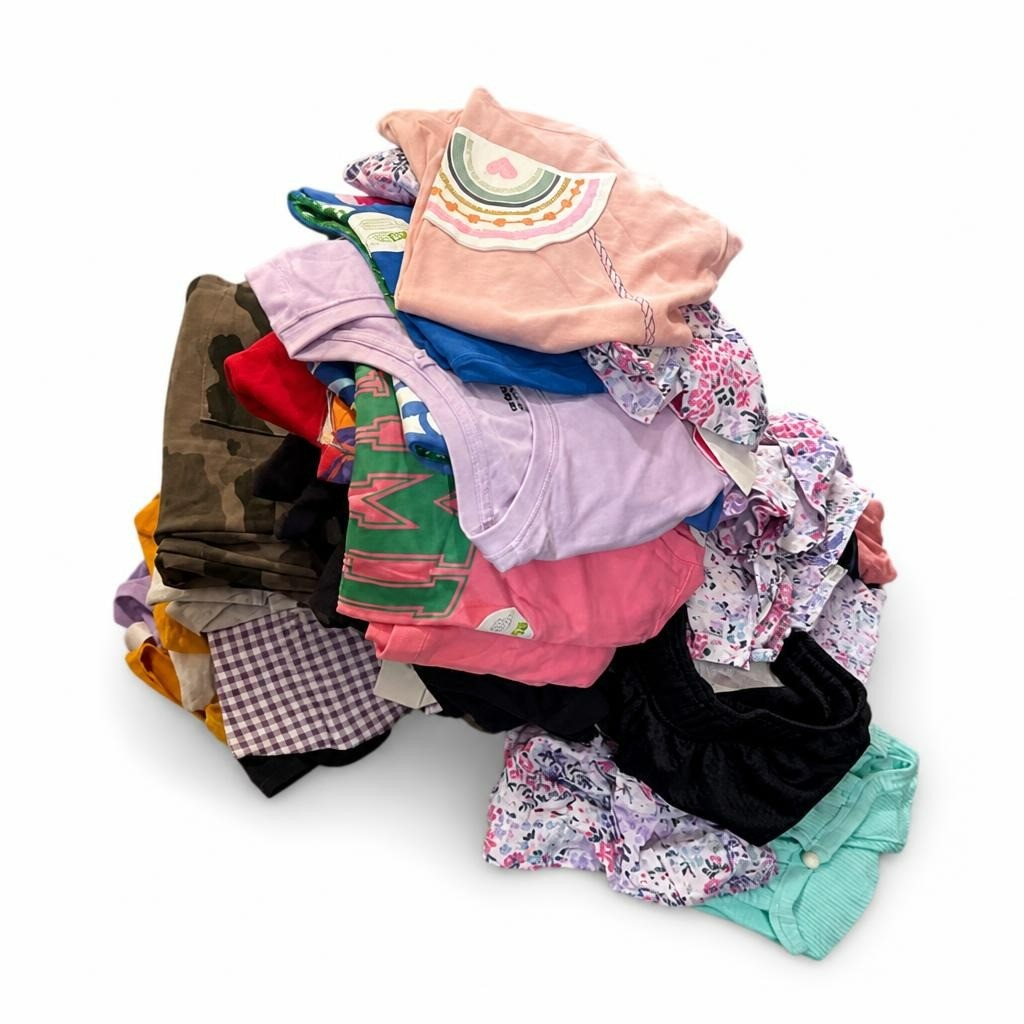 Kids mixed clothing lot - bin overflowing, colorful - white studio shot, second-hand at Why Go Less, Dekwaneh, Lebanon