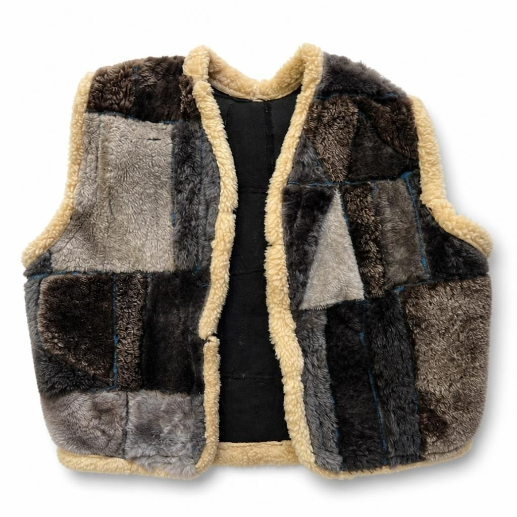 Patchwork shearling fur vest, mixed grey tones - white studio shot, second-hand at Why Go Less, Dekwaneh, Lebanon