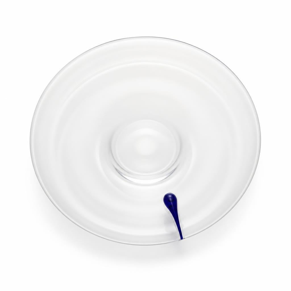 Clear glass serving platter with blue glass spoon - white studio shot, second-hand at Why Go Less, Dekwaneh, Lebanon