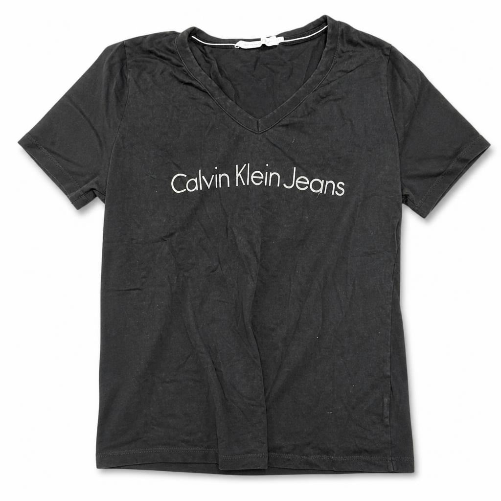 Calvin Klein Jeans black v-neck t-shirt - white studio shot, second-hand at Why Go Less, Dekwaneh, Lebanon