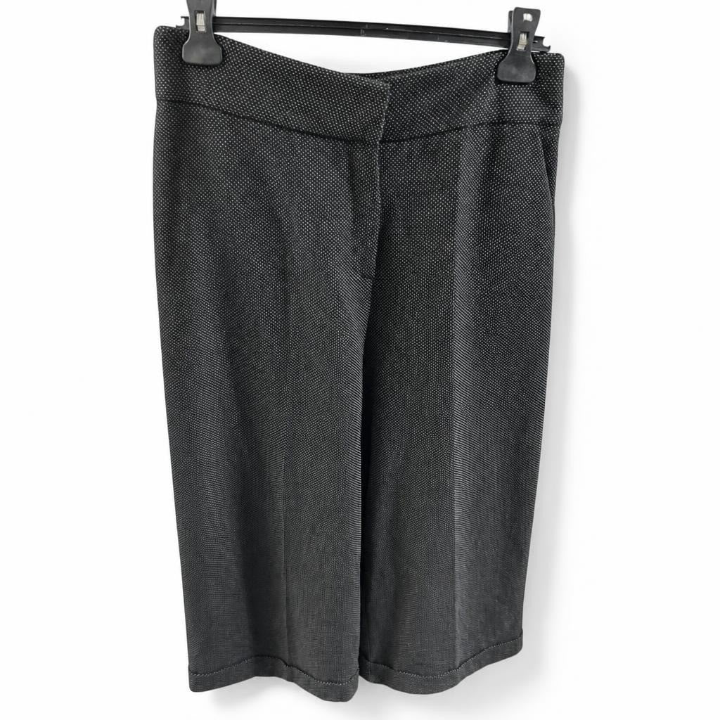 Black polka dot wide-leg culottes, size unknown - white studio shot, second-hand at Why Go Less, Dekwaneh, Lebanon