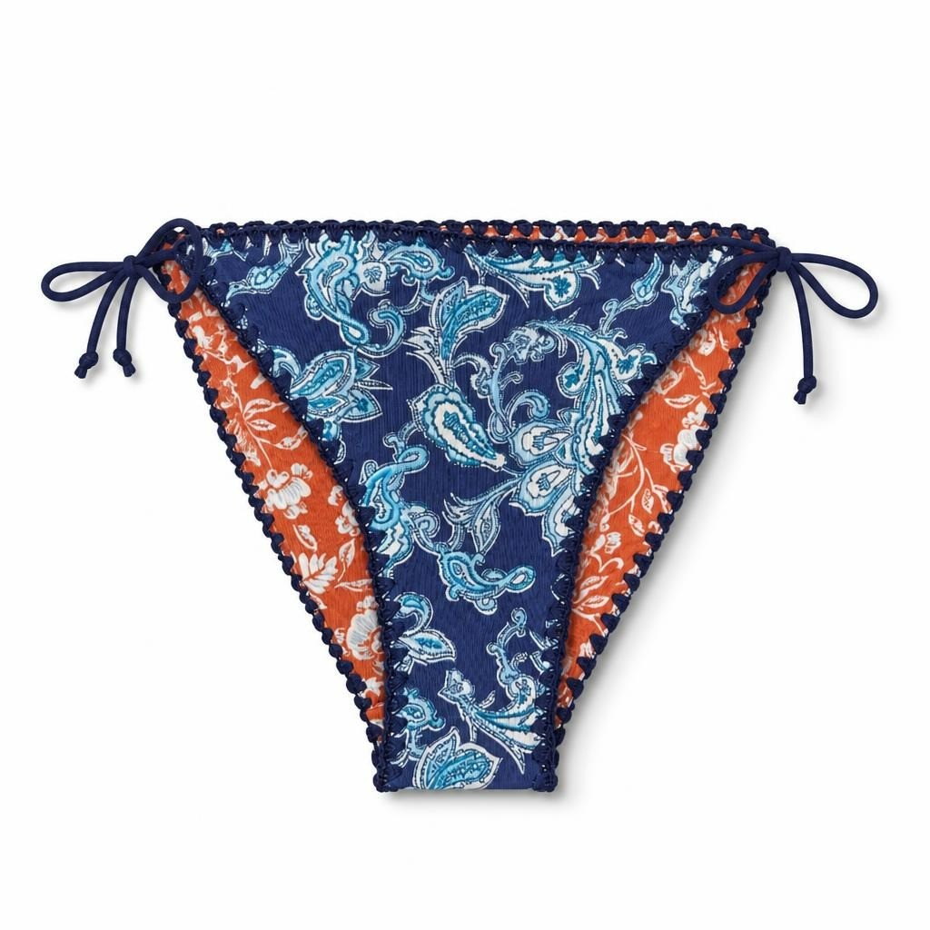 Blue paisley print bikini bottom, tie-side - white studio shot, second-hand at Why Go Less, Dekwaneh, Lebanon