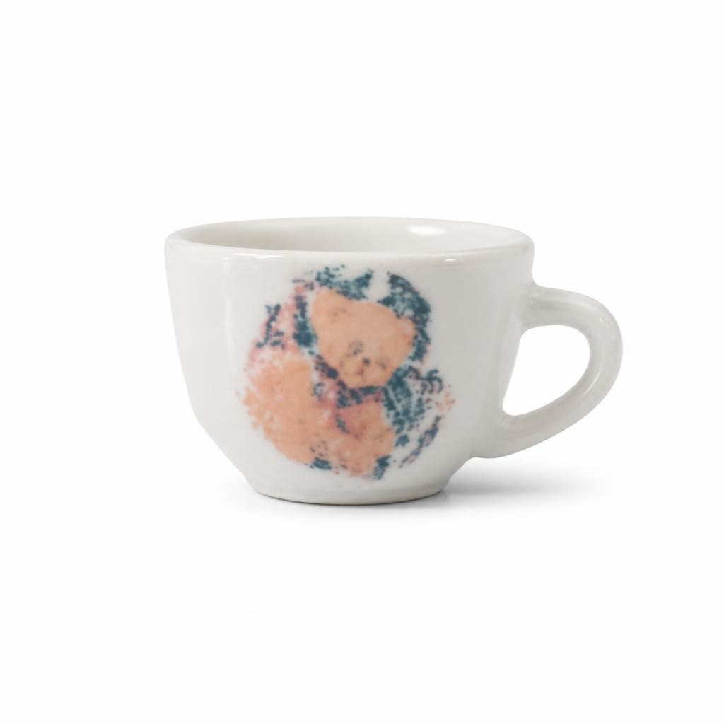 Miniature decorative ceramic tea cup, floral print - white studio shot, second-hand at Why Go Less, Dekwaneh, Lebanon