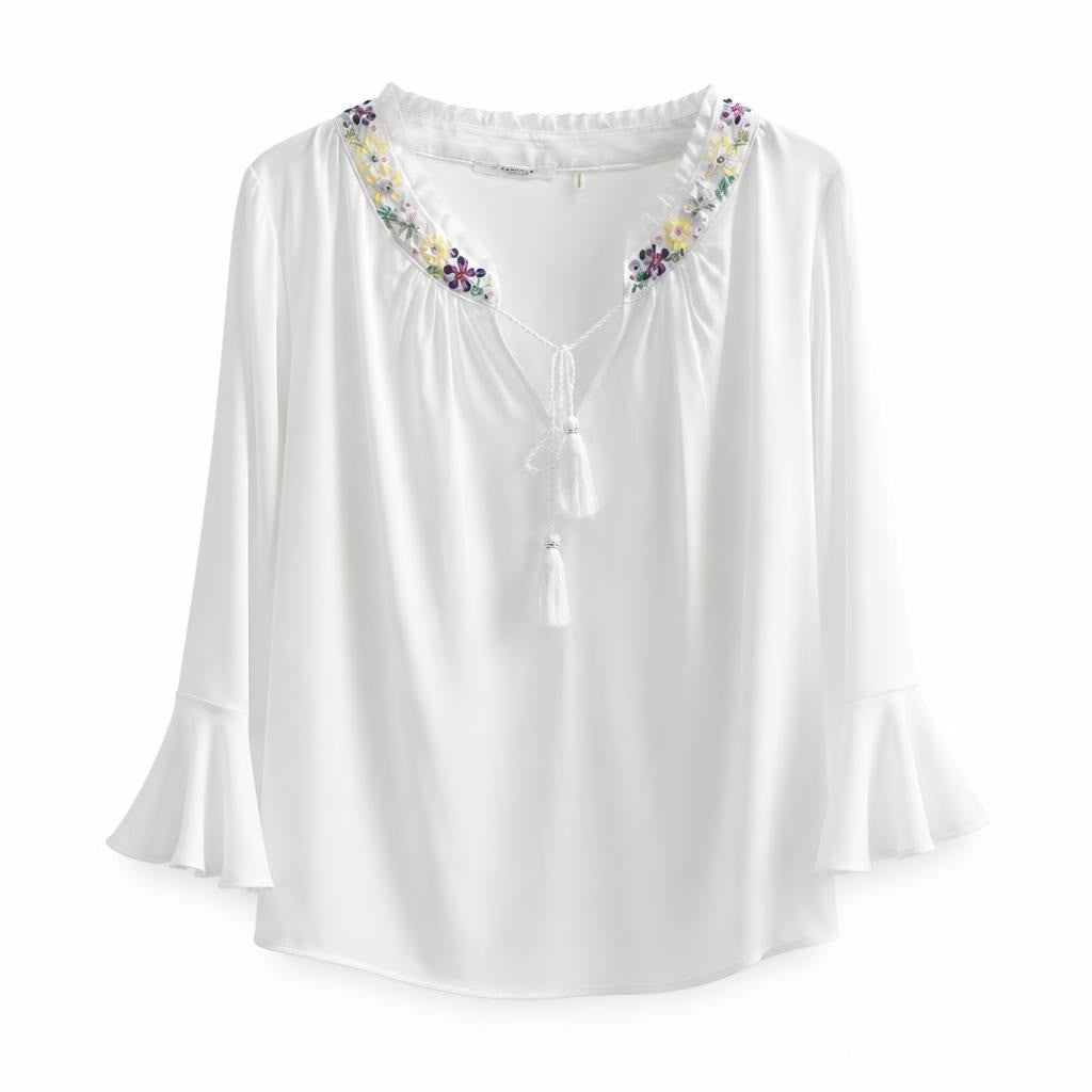 White boho blouse w/ floral beaded neckline - white studio shot, second-hand at Why Go Less, Dekwaneh, Lebanon