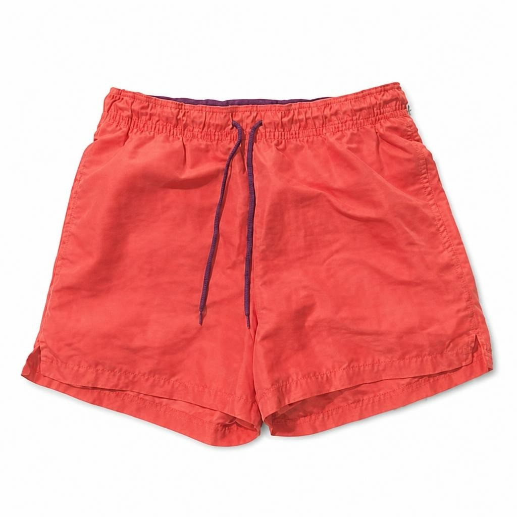 Coral/salmon swim shorts with purple drawstring - white studio shot, second-hand at Why Go Less, Dekwaneh, Lebanon