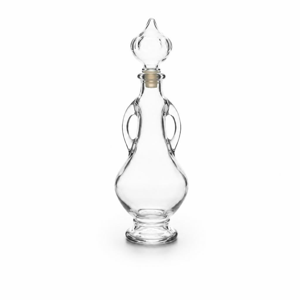 Clear glass decorative stopper bottle, ornate shape - white studio shot, second-hand at Why Go Less, Dekwaneh, Lebanon