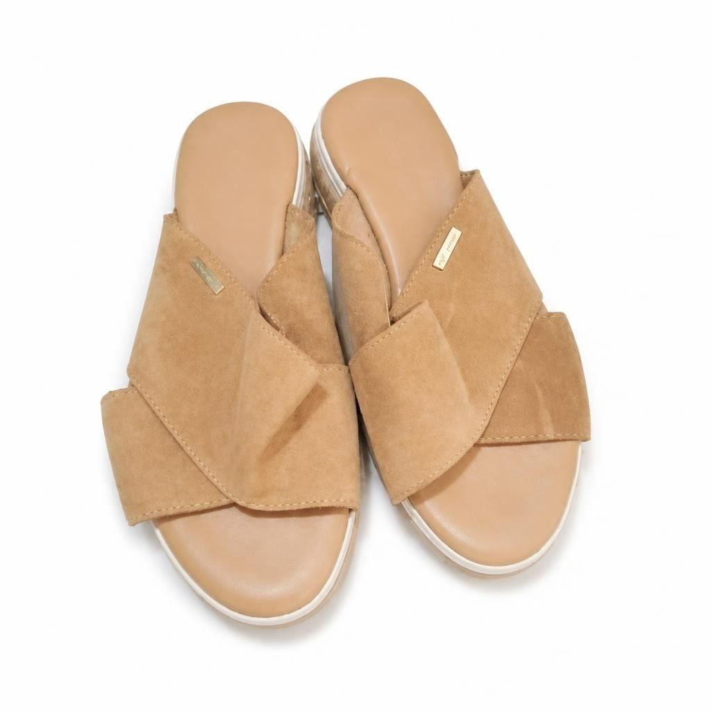 Calvin Klein nude suede cross-strap flat sandals - white studio shot, second-hand at Why Go Less, Dekwaneh, Lebanon