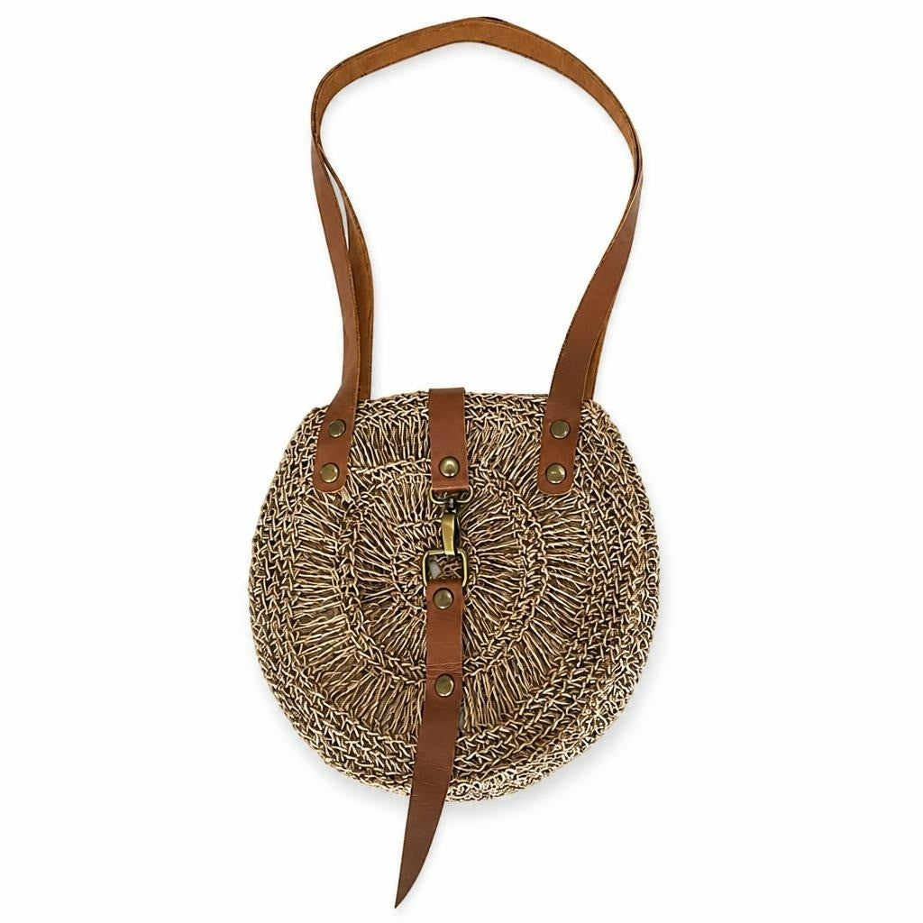 Round woven straw shoulder bag, tan leather strap - white studio shot, second-hand at Why Go Less, Dekwaneh, Lebanon
