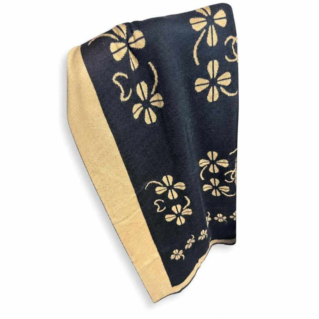 Chanel-logo black & gold floral knit scarf - white studio shot, second-hand at Why Go Less, Dekwaneh, Lebanon