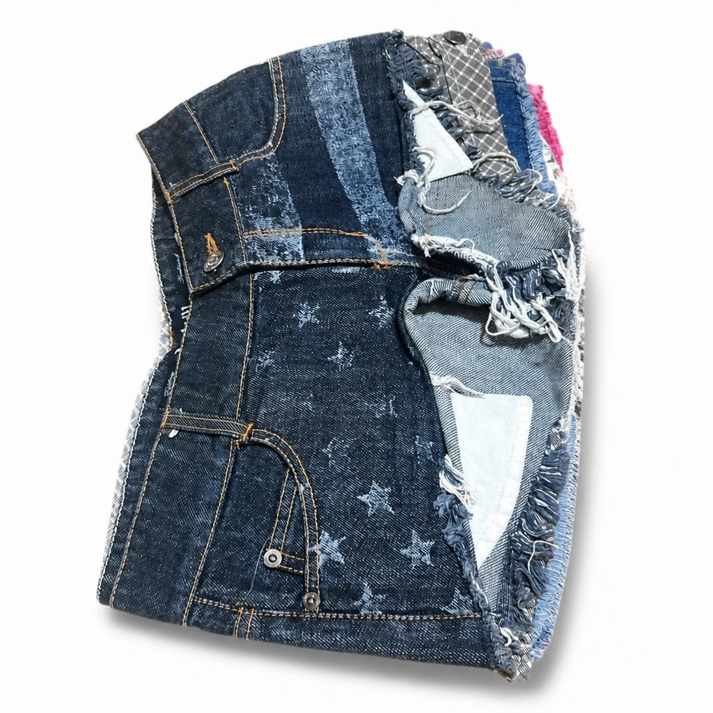 Dark blue denim skirt, star print, frayed hem - white studio shot, second-hand at Why Go Less, Dekwaneh, Lebanon