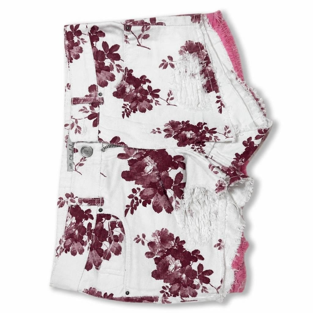 White floral print denim cutoff shorts, pink fringe - white studio shot, second-hand at Why Go Less, Dekwaneh, Lebanon