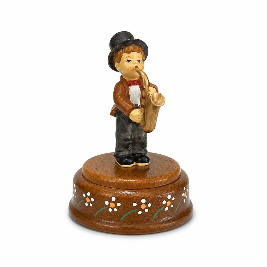 Boy saxophonist music box figurine, wooden base, brown - white studio shot, second-hand at Why Go Less, Dekwaneh, Lebanon