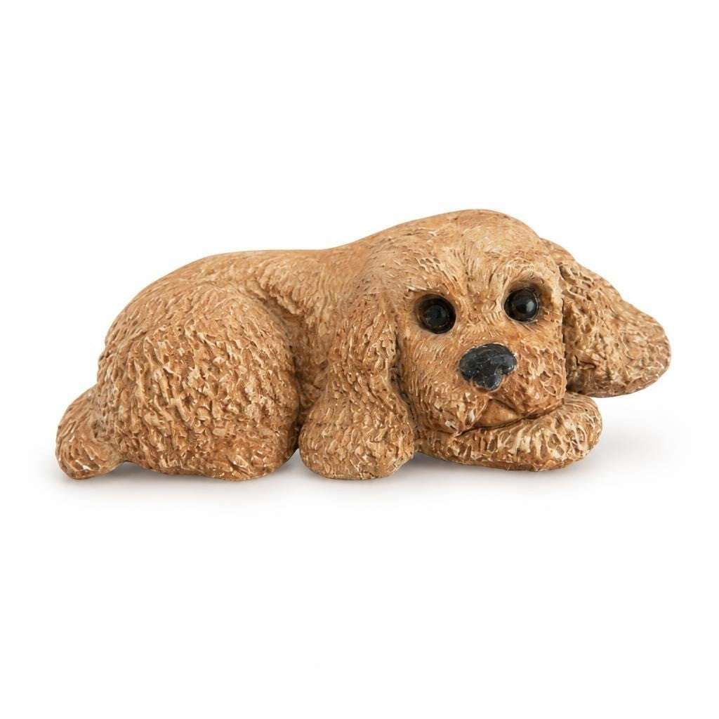 Brown Cocker Spaniel lying resin dog figurine - white studio shot, second-hand at Why Go Less, Dekwaneh, Lebanon