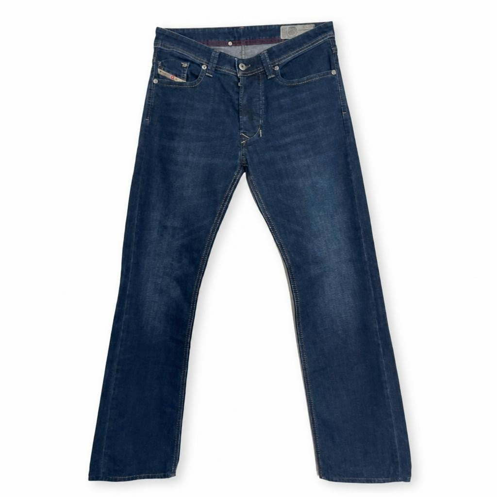 Diesel dark blue bootcut jeans, medium wash - white studio shot, second-hand at Why Go Less, Dekwaneh, Lebanon