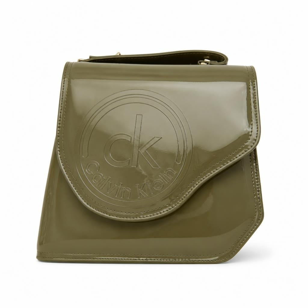 Calvin Klein olive patent leather logo crossbody bag - white studio shot, second-hand at Why Go Less, Dekwaneh, Lebanon