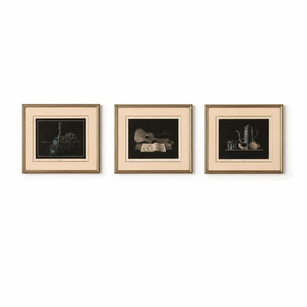 Set of three framed black and white still life prints