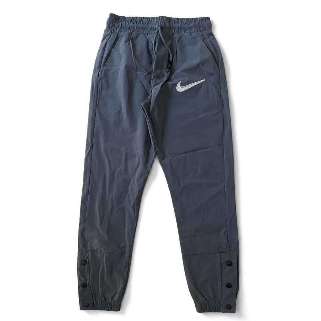 Nike woven jogger pants, dark gray | New | Why Go Less