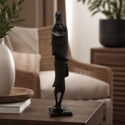 Dark wood carved African standing figure sculpture - lifestyle shot, second-hand at Why Go Less, Dekwaneh, Lebanon