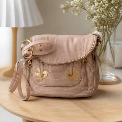 Blush pink leather handbag gold bird hardware - lifestyle shot, second-hand at Why Go Less, Dekwaneh, Lebanon