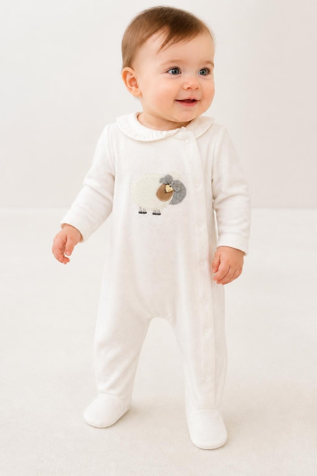 Ivory Velour Sheep Applique Footed Baby Sleeper - on model shot, second-hand at Why Go Less, Dekwaneh, Lebanon