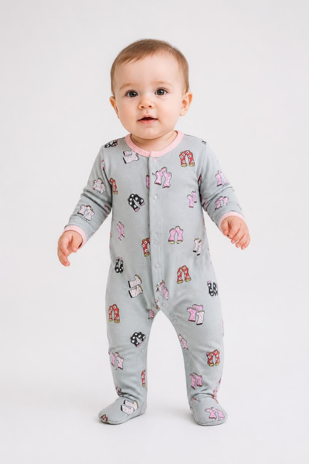Sage Green Footed Baby Sleepsuit With Wellies Print - on model shot, second-hand at Why Go Less, Dekwaneh, Lebanon