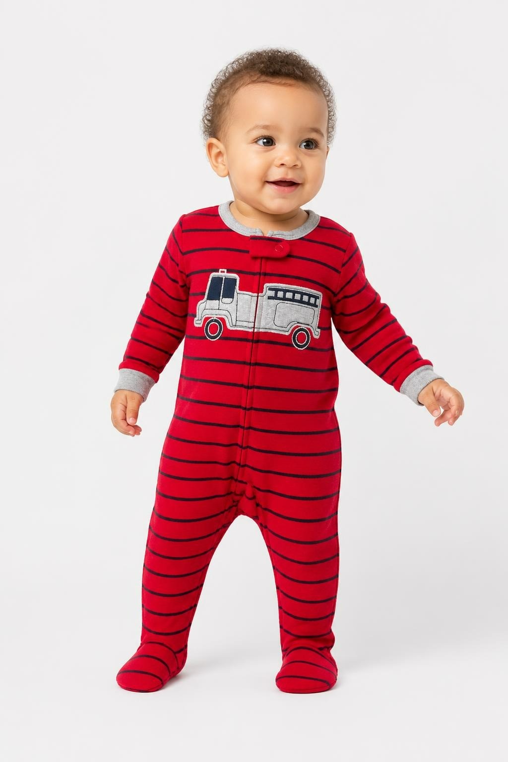Red Stripe Fire Truck Fleece Footed Baby Sleeper - on model shot, second-hand at Why Go Less, Dekwaneh, Lebanon