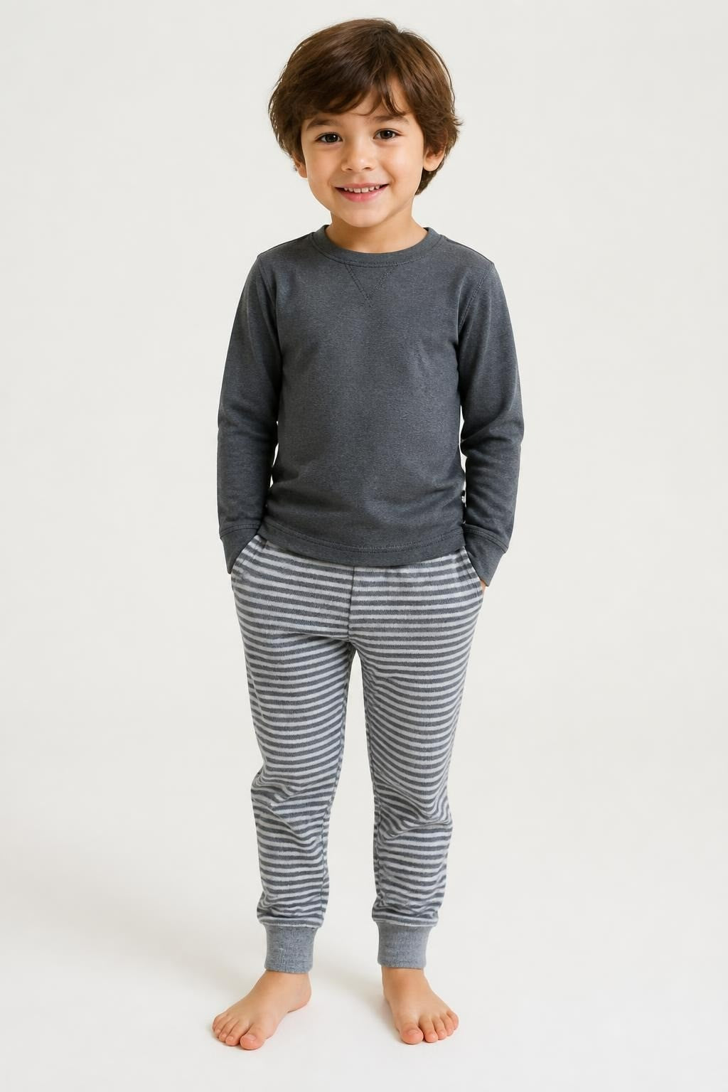 Red Black Plaid Flannel Kids Pants folded - on model shot, second-hand at Why Go Less, Dekwaneh, Lebanon