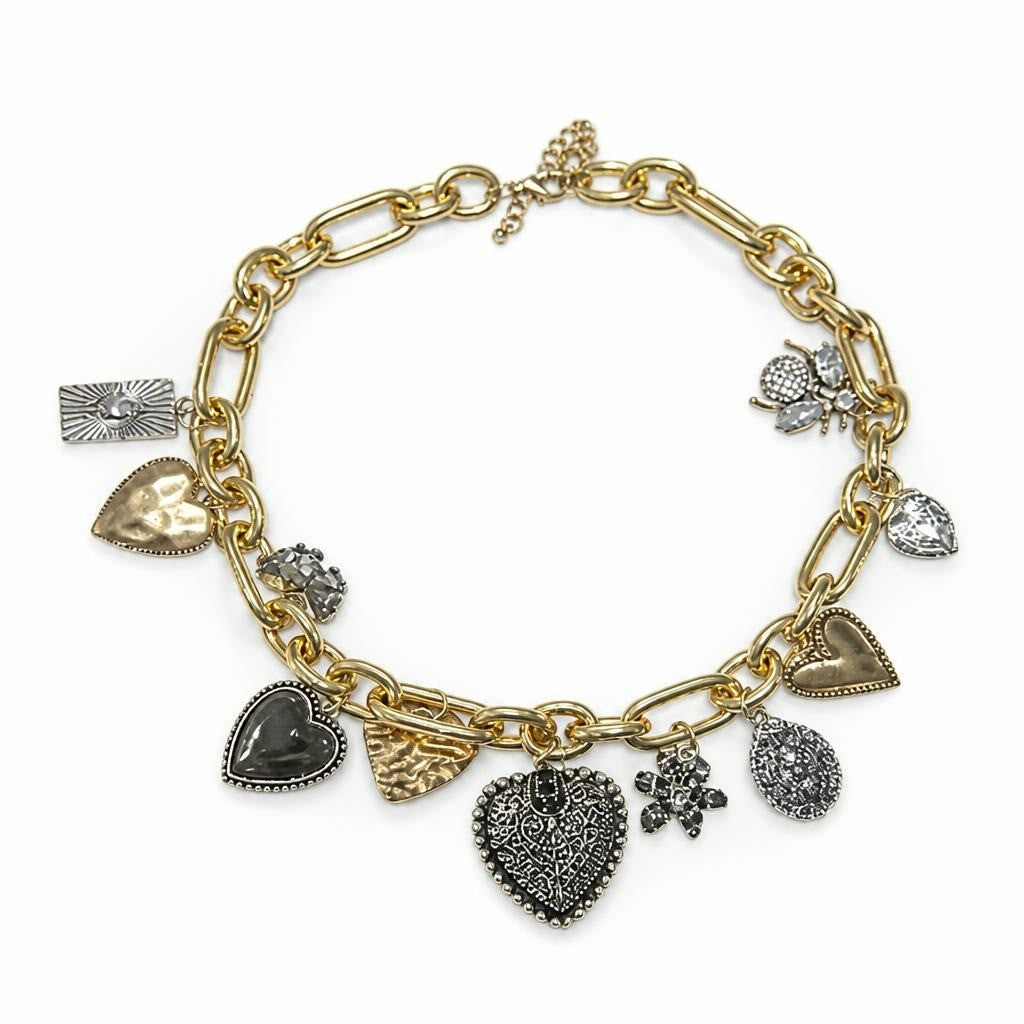 Gold-tone charm bracelet with heart and flower charms - new at Why Go Less, Lebanon