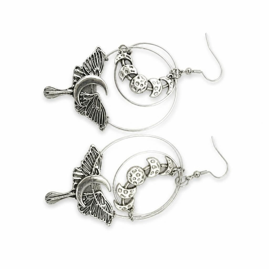 Silver-tone hoop earrings with moon phase dangle - new at Why Go Less, Lebanon